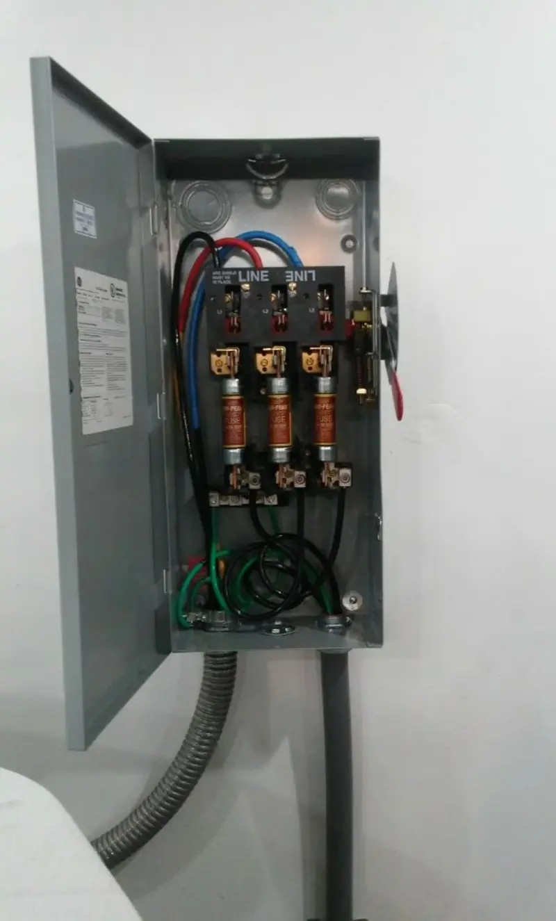 Three-phase disconnect switch installed for Smoke Detector Installation in Taos
